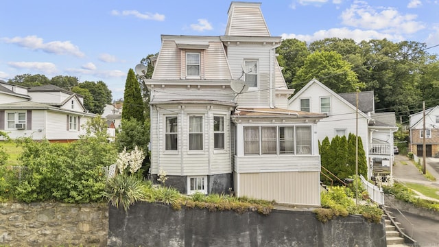 33 Aetna St, Naugatuck, CT 06770 - rear view of property featuring mansard roof