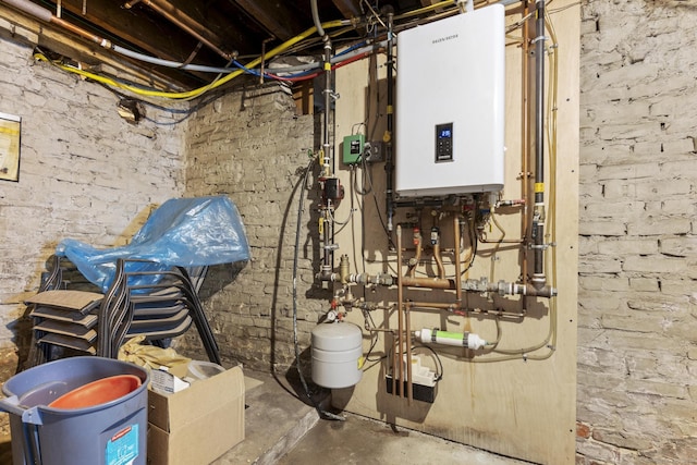 33 Aetna St, Naugatuck, CT 06770 - utility room featuring tankless water heater