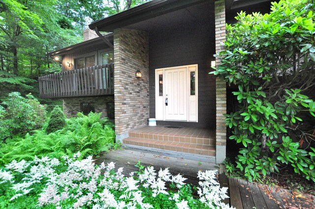 172 Bentley Cir, Goshen, CT 06756 - doorway to property with brick siding