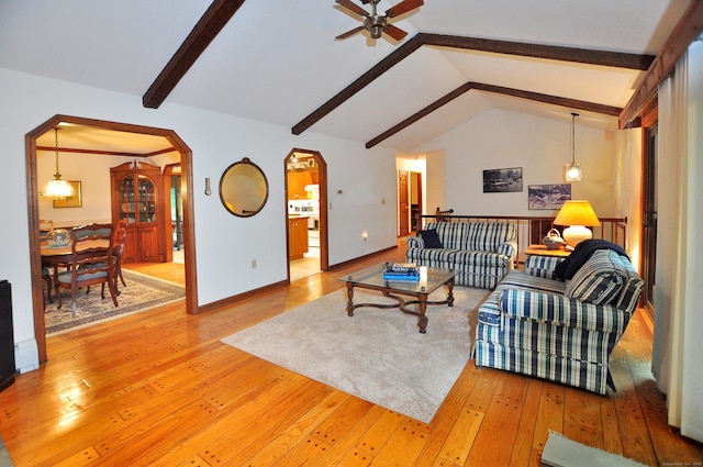 172 Bentley Cir, Goshen, CT 06756 - living room with arched walkways, ceiling fan, and hardwood / wood-style floors