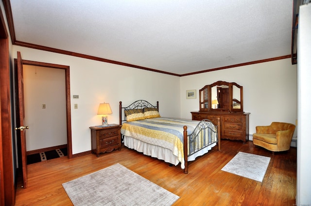 172 Bentley Cir, Goshen, CT 06756 - bedroom with light wood finished floors and ornamental molding