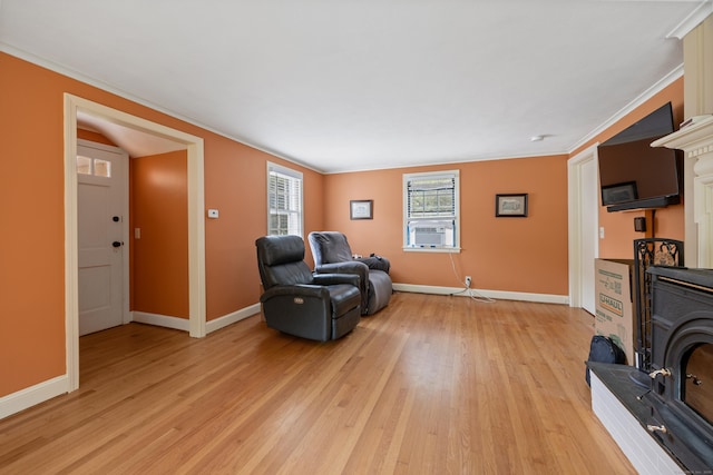 931 Chestnut Hill Rd, Glastonbury, CT 06073 - sitting room with light wood-type flooring and crown molding
