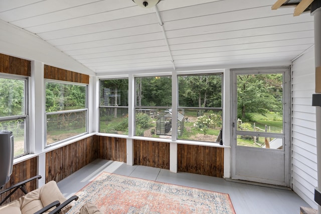 931 Chestnut Hill Rd, Glastonbury, CT 06073 - unfurnished sunroom featuring lofted ceiling, wooden walls, and wood finished floors
