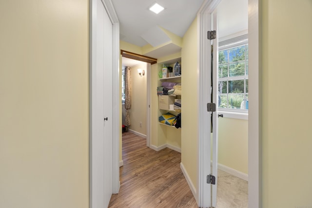 931 Chestnut Hill Rd, Glastonbury, CT 06073 - hallway featuring light wood finished floors and baseboards