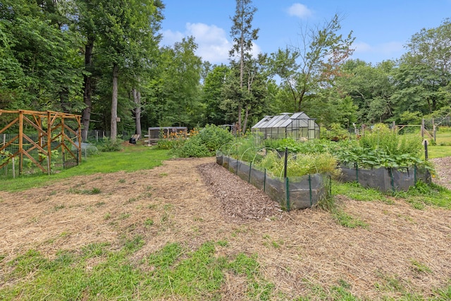 931 Chestnut Hill Rd, Glastonbury, CT 06073 - view of yard featuring an exterior structure, a vegetable garden, and an outdoor structure