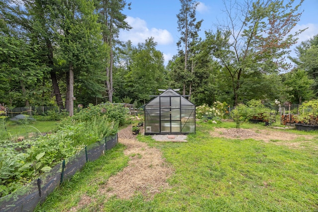 931 Chestnut Hill Rd, Glastonbury, CT 06073 - view of yard with an exterior structure, a garden, and an outdoor structure