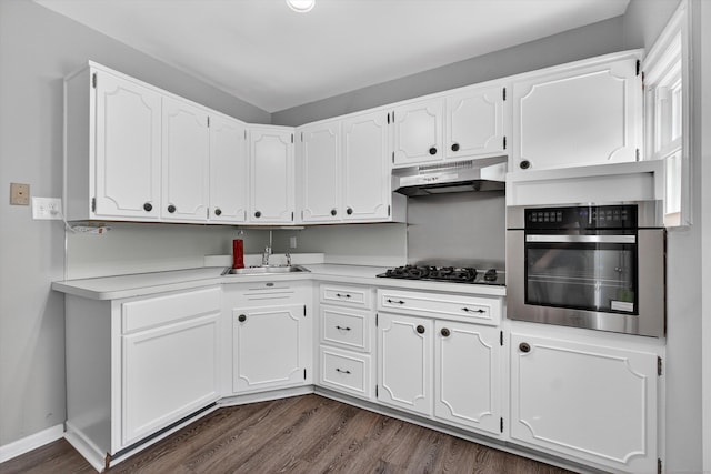 3 Moody Ln, Danbury, CT 06811 - kitchen with stainless steel oven, black gas stovetop, dark wood-type flooring, white cabinets, and light countertops