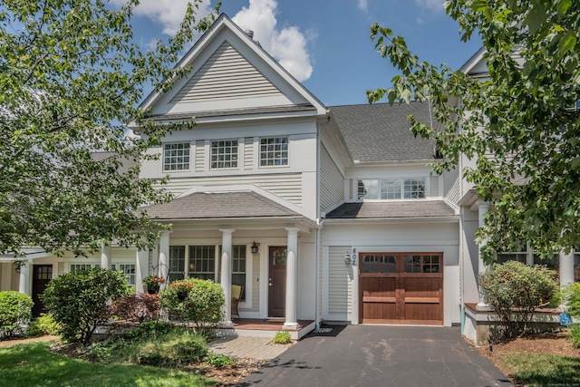 802 Dzen Way Unit 802, South Windsor, CT 06074 - neoclassical / greek revival house featuring an attached garage, asphalt driveway, and a shingled roof