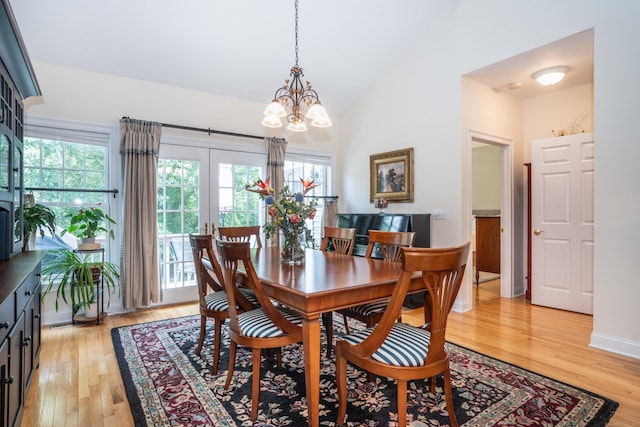 802 Dzen Way Unit 802, South Windsor, CT 06074 - dining area with a chandelier, light wood-style floors, and high vaulted ceiling