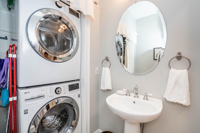 802 Dzen Way Unit 802, South Windsor, CT 06074 - laundry room featuring stacked washer / dryer
