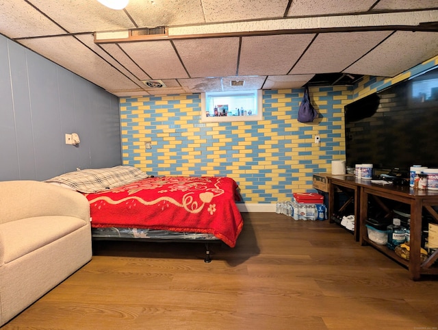715 Burnsford Ave, Bridgeport, CT 06606 - bedroom with a paneled ceiling and wood finished floors