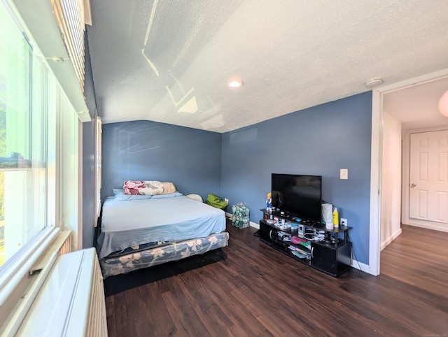 715 Burnsford Ave, Bridgeport, CT 06606 - bedroom featuring a textured ceiling, wood finished floors, and lofted ceiling