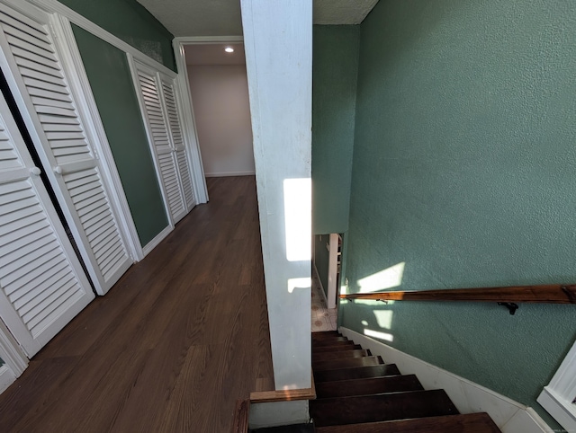 715 Burnsford Ave, Bridgeport, CT 06606 - stairway with a textured wall and wood finished floors