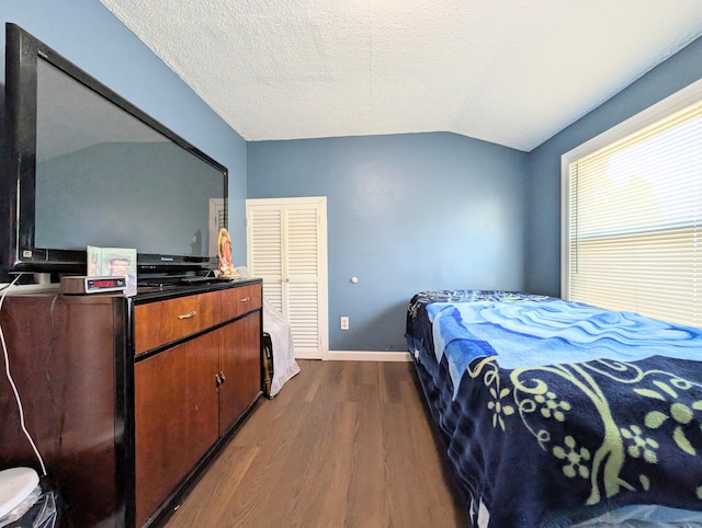 715 Burnsford Ave, Bridgeport, CT 06606 - bedroom with lofted ceiling and dark wood-type flooring