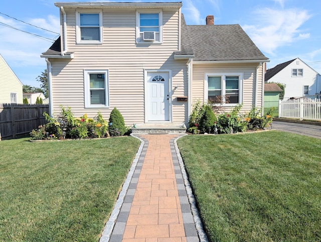 715 Burnsford Ave, Bridgeport, CT 06606 - traditional-style home featuring a chimney, cooling unit, and a shingled roof