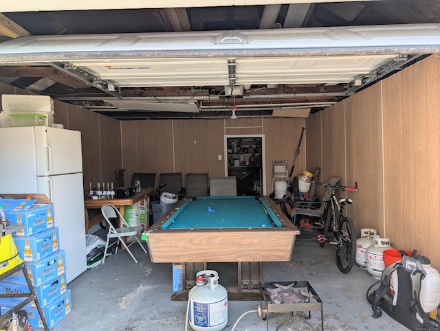 715 Burnsford Ave, Bridgeport, CT 06606 - garage featuring freestanding refrigerator and wooden walls