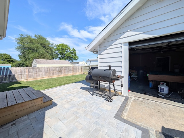 715 Burnsford Ave, Bridgeport, CT 06606 - fenced backyard with area for grilling and a patio