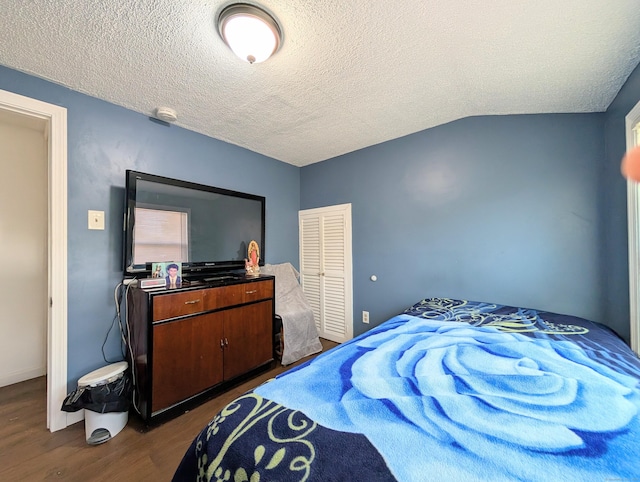 715 Burnsford Ave, Bridgeport, CT 06606 - bedroom with dark wood-style floors and a textured ceiling