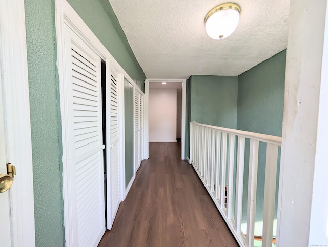 715 Burnsford Ave, Bridgeport, CT 06606 - corridor with wood finished floors and a textured ceiling