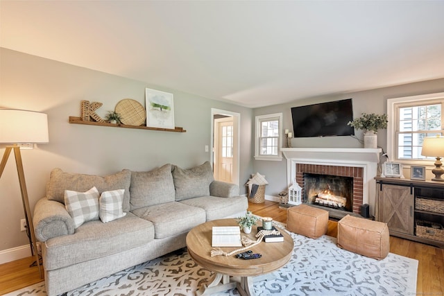 216 Main St, Glastonbury, CT 06073 - living room featuring wood finished floors and a fireplace