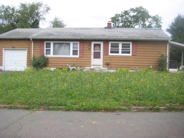 63 Cynthia Dr, West Haven, CT 06516 - view of front of property with a garage and a chimney