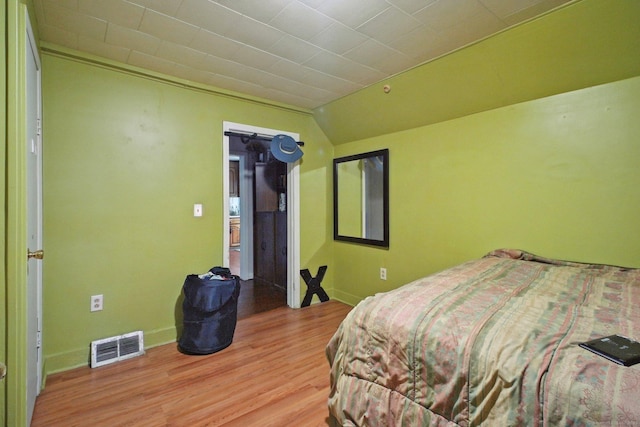 32 Williams St, Bristol, CT 06010 - bedroom with wood finished floors and lofted ceiling