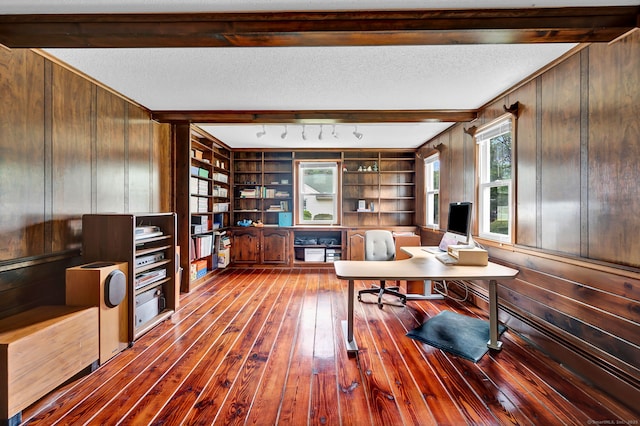 186 Wood Pond Rd, South Windsor, CT 06074 - home office with hardwood / wood-style flooring, beam ceiling, and wood walls