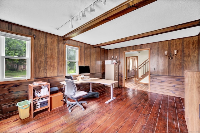 186 Wood Pond Rd, South Windsor, CT 06074 - home office featuring wood walls, plenty of natural light, dark wood-type flooring, a textured ceiling, and rail lighting