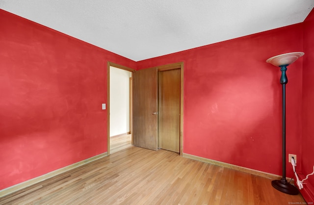 186 Wood Pond Rd, South Windsor, CT 06074 - unfurnished room featuring wood finished floors and baseboards