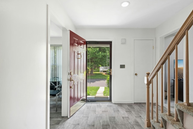 376 Woodridge Unit 376, Shelton, CT 06484 - entryway with stairway and light wood-type flooring