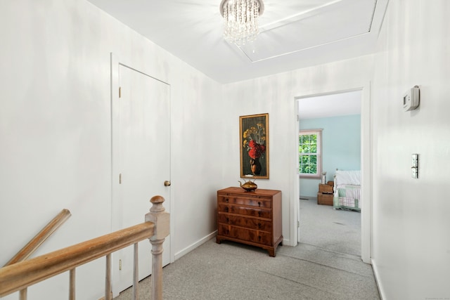 376 Woodridge Unit 376, Shelton, CT 06484 - corridor featuring attic access, light carpet, and an upstairs landing