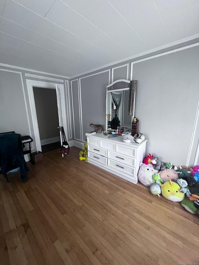 9 Starkweather St, Manchester, CT 06042 - unfurnished living room with a decorative wall and dark wood-style floors