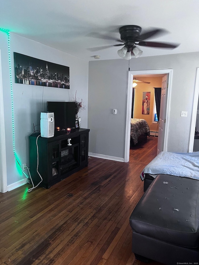 9 Starkweather St, Manchester, CT 06042 - living room featuring a ceiling fan, wood-type flooring, and a baseboard radiator
