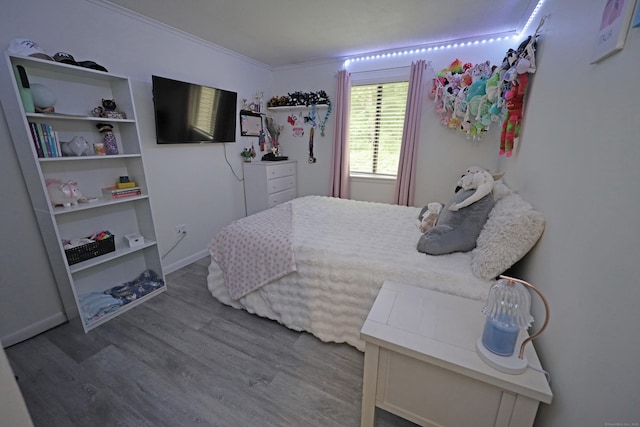 44 Hitching Post Ln Unit 44, Glastonbury, CT 06033 - bedroom with wood finished floors and crown molding