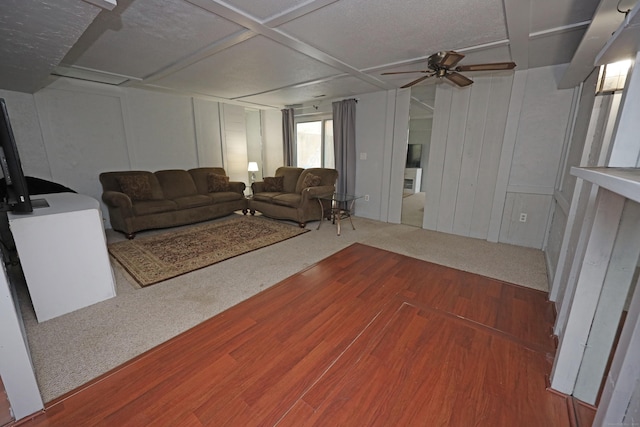 44 Hitching Post Ln Unit 44, Glastonbury, CT 06033 - living area with a ceiling fan, wood finished floors, a decorative wall, and coffered ceiling