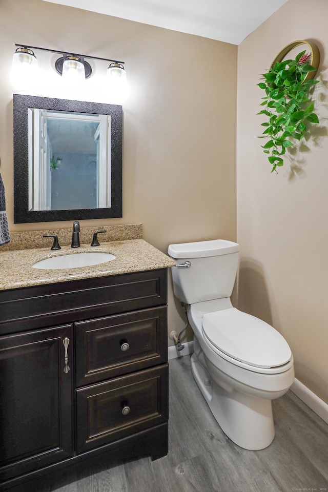 44 Hitching Post Ln Unit 44, Glastonbury, CT 06033 - half bath featuring wood finished floors and vanity