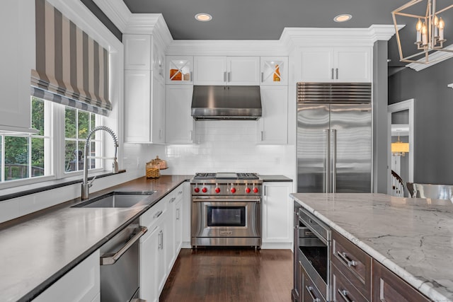 8 Jacob Ln, Killingworth, CT 06419 - kitchen with high end appliances, under cabinet range hood, recessed lighting, white cabinetry, and dark wood-style floors