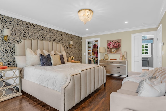 8 Jacob Ln, Killingworth, CT 06419 - bedroom featuring ornamental molding, a spacious closet, dark wood-style flooring, wallpapered walls, and a closet