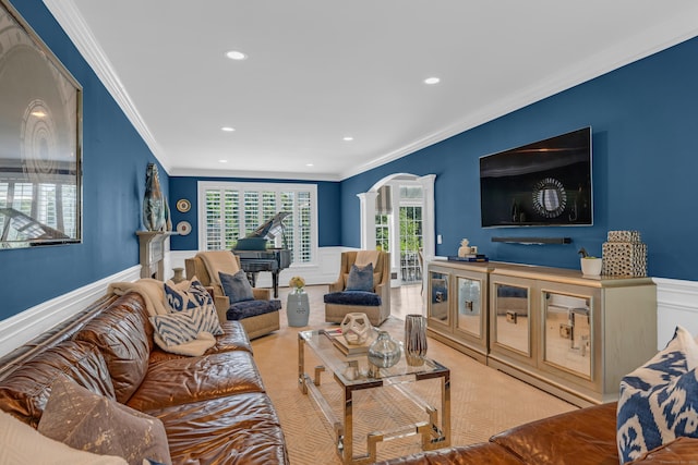 8 Jacob Ln, Killingworth, CT 06419 - living area featuring arched walkways, ornamental molding, recessed lighting, and a wainscoted wall