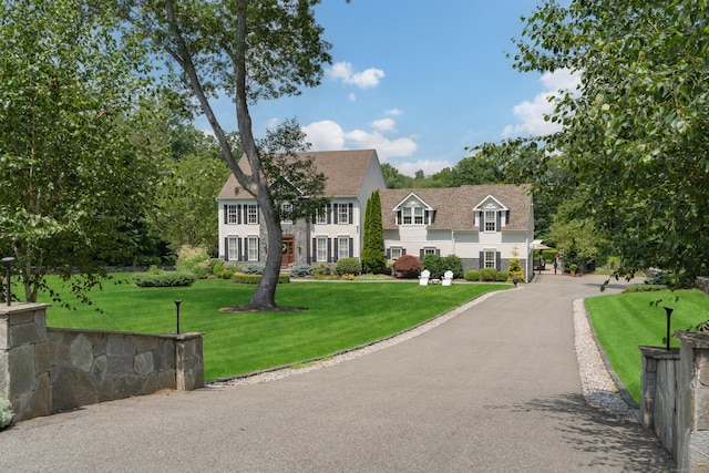 8 Jacob Ln, Killingworth, CT 06419 - view of front of home featuring a front yard and a shingled roof