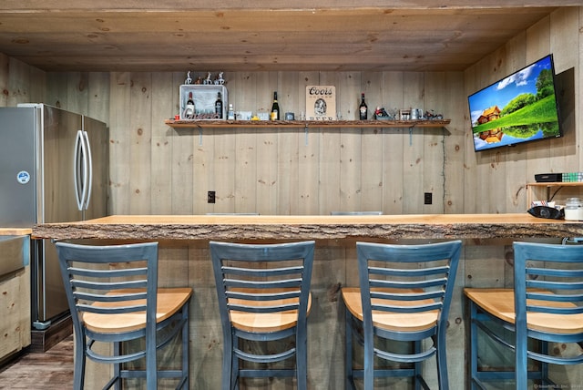 85 Good Hill Rd, Roxbury, CT 06783 - indoor wet bar with wooden ceiling, freestanding refrigerator, wood finished floors, and wooden walls