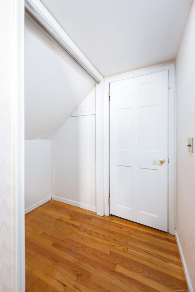 282 Curtiss St, Southington, CT 06489 - bonus room with light wood-style flooring and vaulted ceiling