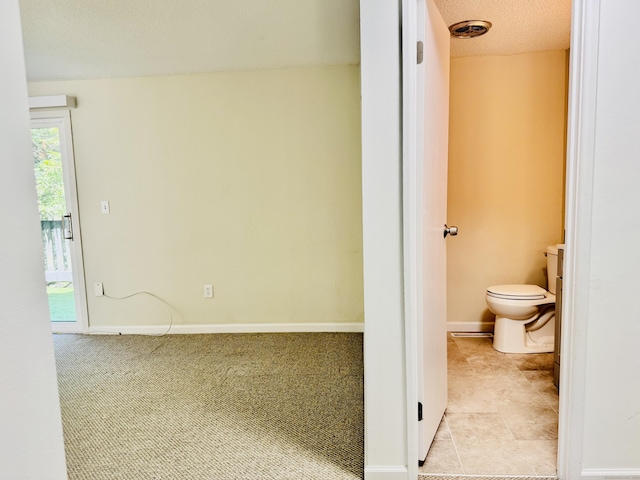 93 Trolley Crossing Ln Unit 93, Middletown, CT 06457 - bathroom featuring toilet and baseboards