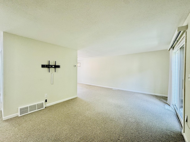 93 Trolley Crossing Ln Unit 93, Middletown, CT 06457 - carpeted empty room featuring a textured ceiling and baseboards