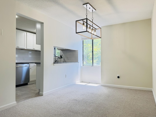 93 Trolley Crossing Ln Unit 93, Middletown, CT 06457 - unfurnished dining area featuring light colored carpet