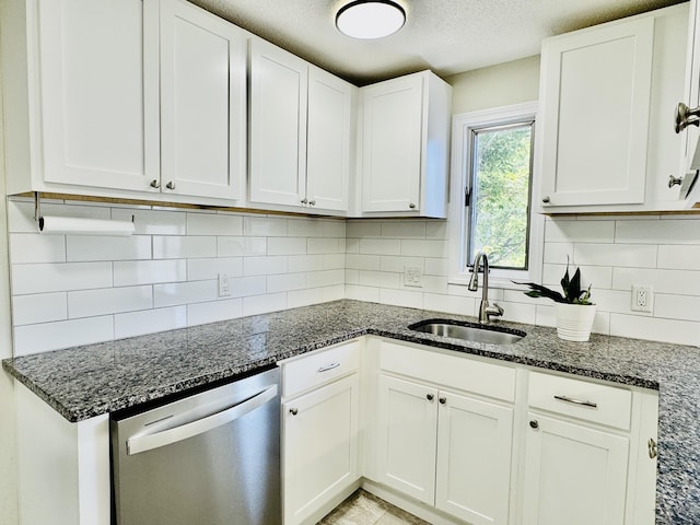 93 Trolley Crossing Ln Unit 93, Middletown, CT 06457 - kitchen featuring stainless steel dishwasher, white cabinetry, decorative backsplash, and a textured ceiling