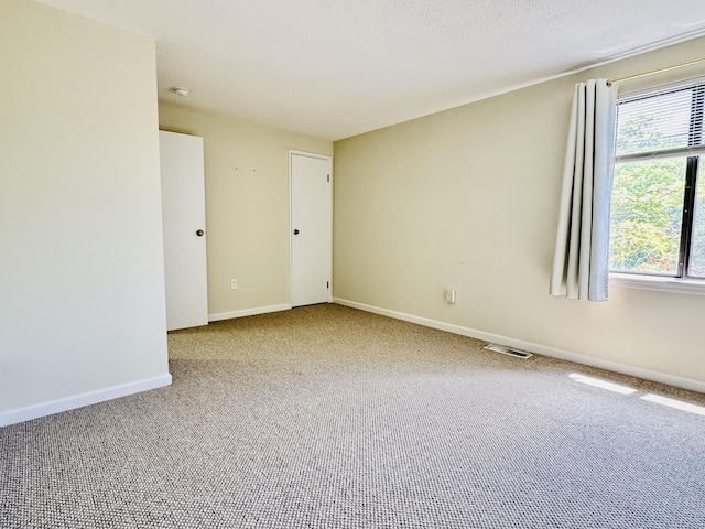 93 Trolley Crossing Ln Unit 93, Middletown, CT 06457 - carpeted empty room with baseboards and a smoke detector