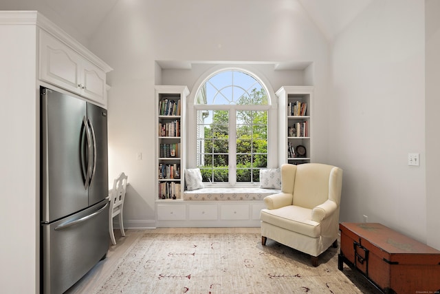 7 Merlins Ln, Newtown, CT 06470 - sitting room featuring vaulted ceiling and light wood-style floors