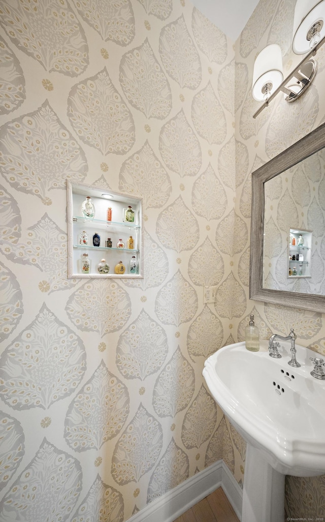 7 Merlins Ln, Newtown, CT 06470 - bathroom with wallpapered walls and wood finished floors