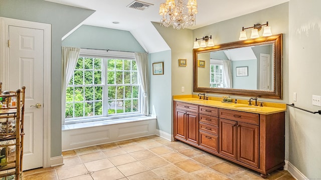 7 Merlins Ln, Newtown, CT 06470 - full bath with double vanity, a chandelier, tile patterned flooring, and lofted ceiling